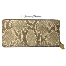 Jet Set Travel Embossed Leather Wallet