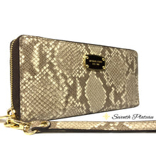 Jet Set Travel Embossed Leather Wallet