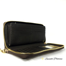 Jet Set Travel Embossed Leather Wallet